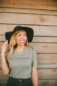 "she is strong" tee